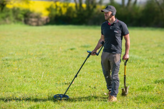 XP ICON metal detector in use